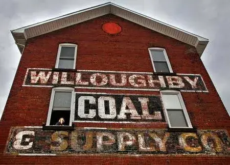 Historic Willoughby Coal & Supply Co. brick façade with painted signage